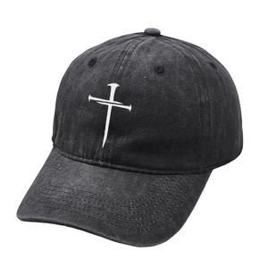 Vintage washed cotton baseball cap with white cross embroidery in charcoal black