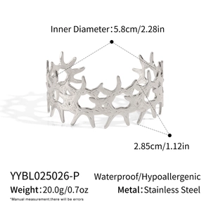 Detailed view of silver stainless steel thorn cuff bracelet with dimension specifications