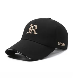 Detailed embroidery of gothic R letter on black cotton twill baseball cap with side text