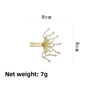 Makroaufnahme der 8cm Goldhaarkamm mit orangefarbenem Stein, Perlen und 7g Nettogewicht