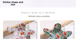 Detailed pattern of gingerbread man hair clips with reindeer and Christmas tree designs
