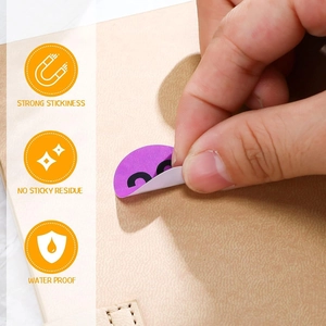 Detail of purple number sticker showing strong stickiness and waterproof texture