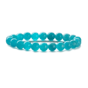 Natural white pine turquoise beaded bracelet with smooth polished round stones on white background