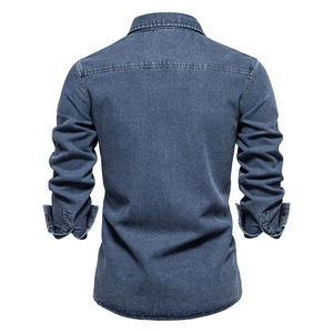Back view of premium vintage blue denim shirt for men with washed cotton fabric finish