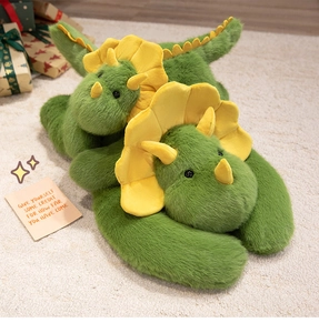 Detail of soft green plush triceratops slippers on a cozy light beige rug