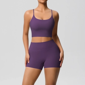 Close-up of purple yoga set featuring U-neck camisole and high-waisted gym shorts