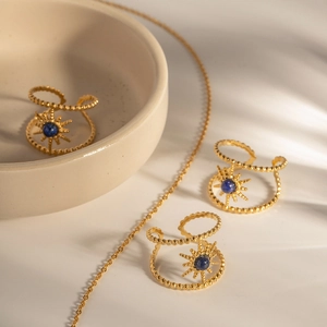 Ins style gold stainless steel starburst rings set with blue lapis lazuli gemstones