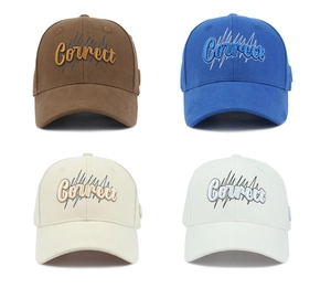 Detailed view of four colorful baseball caps with Correct 3D embroidery in a 2x2 grid