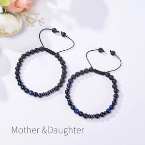Detail of Mother Daughter bracelets with black lava and blue tiger eye stone beads
