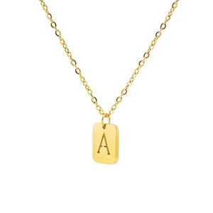 Macro shot of gold-plated titanium steel necklace with square letter A pendant