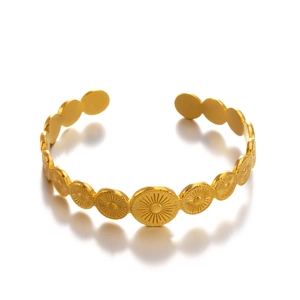 Minimalist gold stainless steel open bangle with sunburst textured geometric circular links