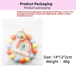 Rainbow tassel keychain with macaron silicone beads and dimensions 14x12x2cm