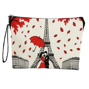 Eiffel Tower print canvas makeup bag with zipper closure and black wrist strap