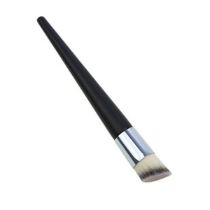 Macro detail of slanted foundation brush with black handle and silver metal ferrule