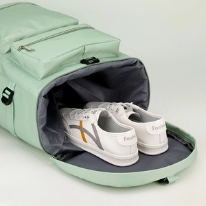 Green fitness travel bag with independent shoe compartment and waterproof fabric
