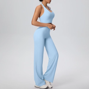 Light blue yoga set featuring a racerback sports bra and high waisted wide leg pants