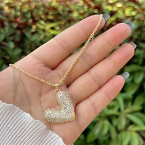 18K gold plated copper heart necklace with sparkling zircon pavé on a thin rope chain