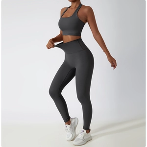 Detail of high waist yoga pants showing elastic waist stretch and tummy control fit