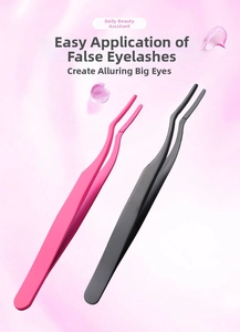 Close-up of professional curved false eyelash applicators in pink and dark grey