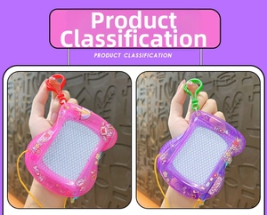 Close-up of pink and purple mini magnetic drawing board keychains with stylus