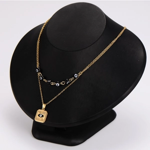 Double-layered golden stainless steel necklace with black beads and square eye pendant