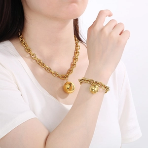 Fashionable gold stainless steel thick chain necklace and bracelet set with round ball charms