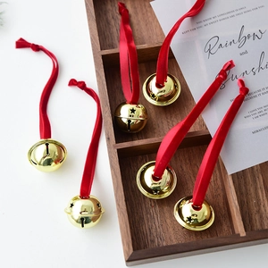 Set of 6 gold hollow star iron bells with red velvet strings for Christmas tree decor