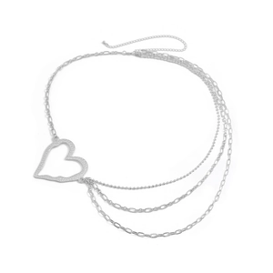 Detailed view of silver layered body chain with textured heart pendant and lobster clasp