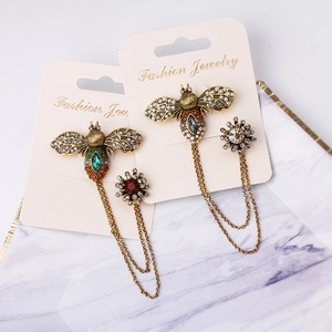 Vintage bee brooch with double chains and rhinestone flower for sweaters and coats