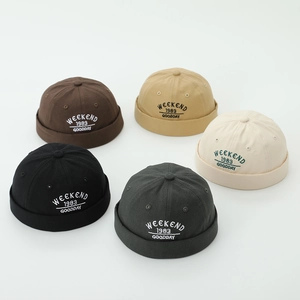 Kids cotton miki hat with weekend embroidery available in five neutral colors