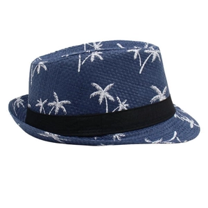Detail of blue straw fedora featuring white palm tree patterns and black decorative ribbon
