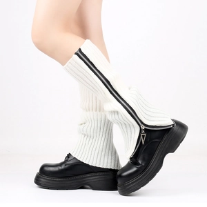 White knitted leg warmers with black zipper detail for winter fashion boot covers
