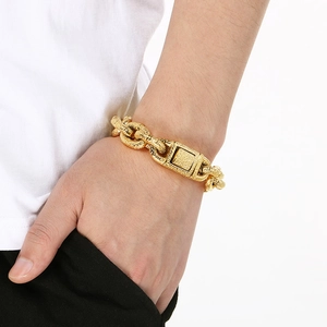 Detail of heavy vintage punk men's titanium steel bracelet with hammered texture finish