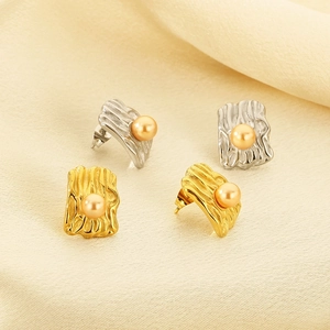 Modern irregular textured square stud earrings with shell pearls in gold and silver finish