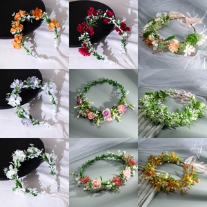 Floral wreath headbands with artificial flowers and ribbons in assorted vibrant colors