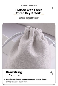 Close-up of soft grey microfiber jewelry pouch with textured drawstring and woven detail