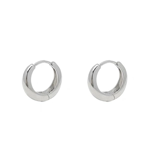 Pair of minimalist S925 sterling silver hoop earrings with polished finish on white background