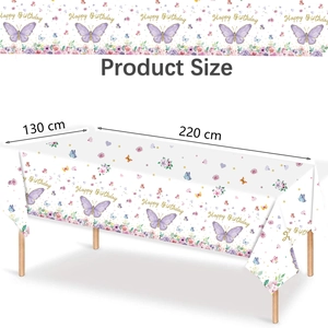 Detailed view of white disposable birthday tablecloth with purple butterfly and flowers