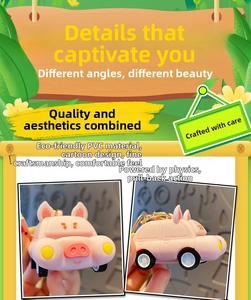 Detailed view of pink pig pull-back toy car keychain made of eco-friendly PVC material