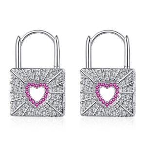 Silver lock earrings with pink heart gemstones and pavé stones on a white background