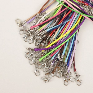 Colorful waxed cord necklaces with lobster clasps and extension chains displayed in fan layout