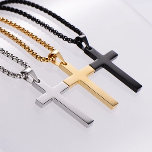 Minimalist cross necklaces for men in silver, gold, and black steel on reflective base