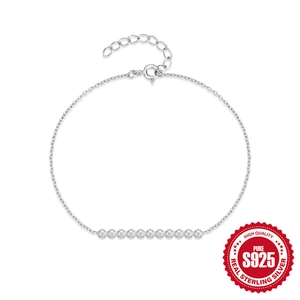 Minimalist S925 sterling silver bracelet with a row of ten sparkling round-cut crystals