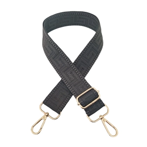 Adjustable dark gray shoulder strap with gold hardware and greek meander pattern