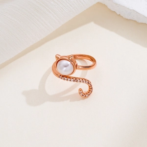 Elegant rose gold cat ring featuring a round pearl and sparkling zircon stones