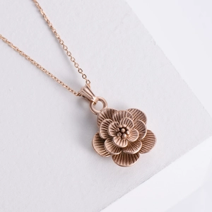 3D rose gold stainless steel flower pendant necklace with detailed layered petals