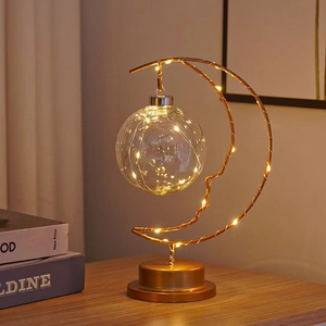 Golden iron moon LED lamp with glass ball and warm copper wire lights for home decor