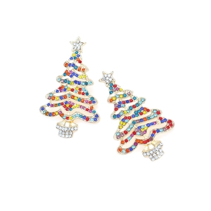 Detail of gold Christmas tree earrings with colorful rhinestones on a white background