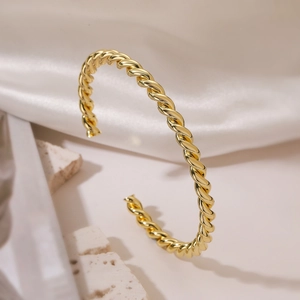 Bracciale rigido aperto a corda intrecciata placcato oro su seta elegante