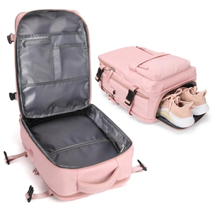 Detail view of pink nylon backpack with shoe compartment and organized interior storage